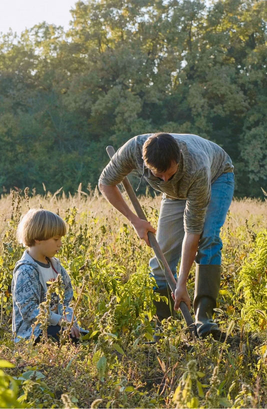 Father and son gardening in Terrell, TX